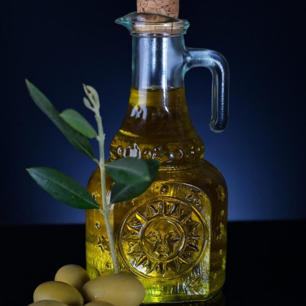 premium olive oil bottle with olives dark background high quality product
